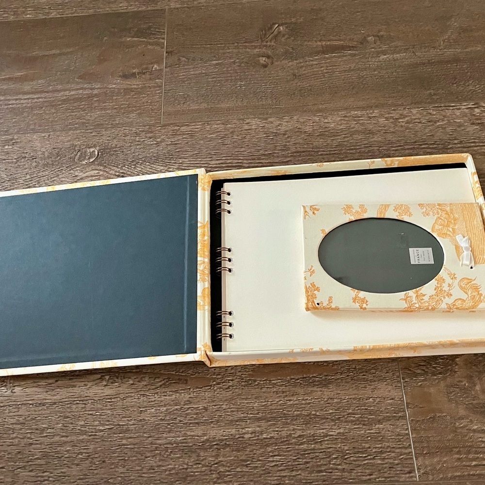 Baby book and photo frame France